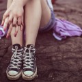 girl sitting on the ground