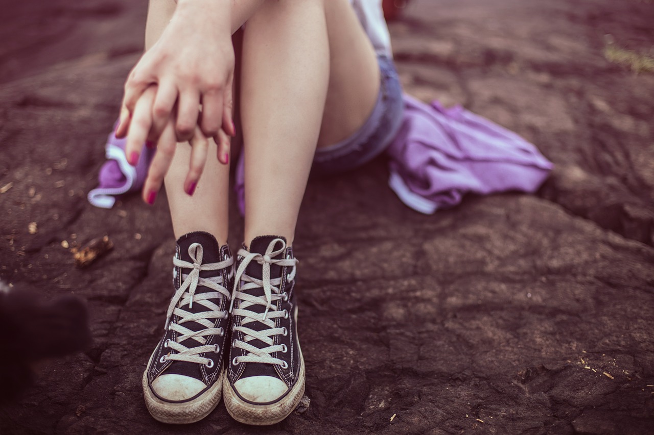 girl sitting on the ground