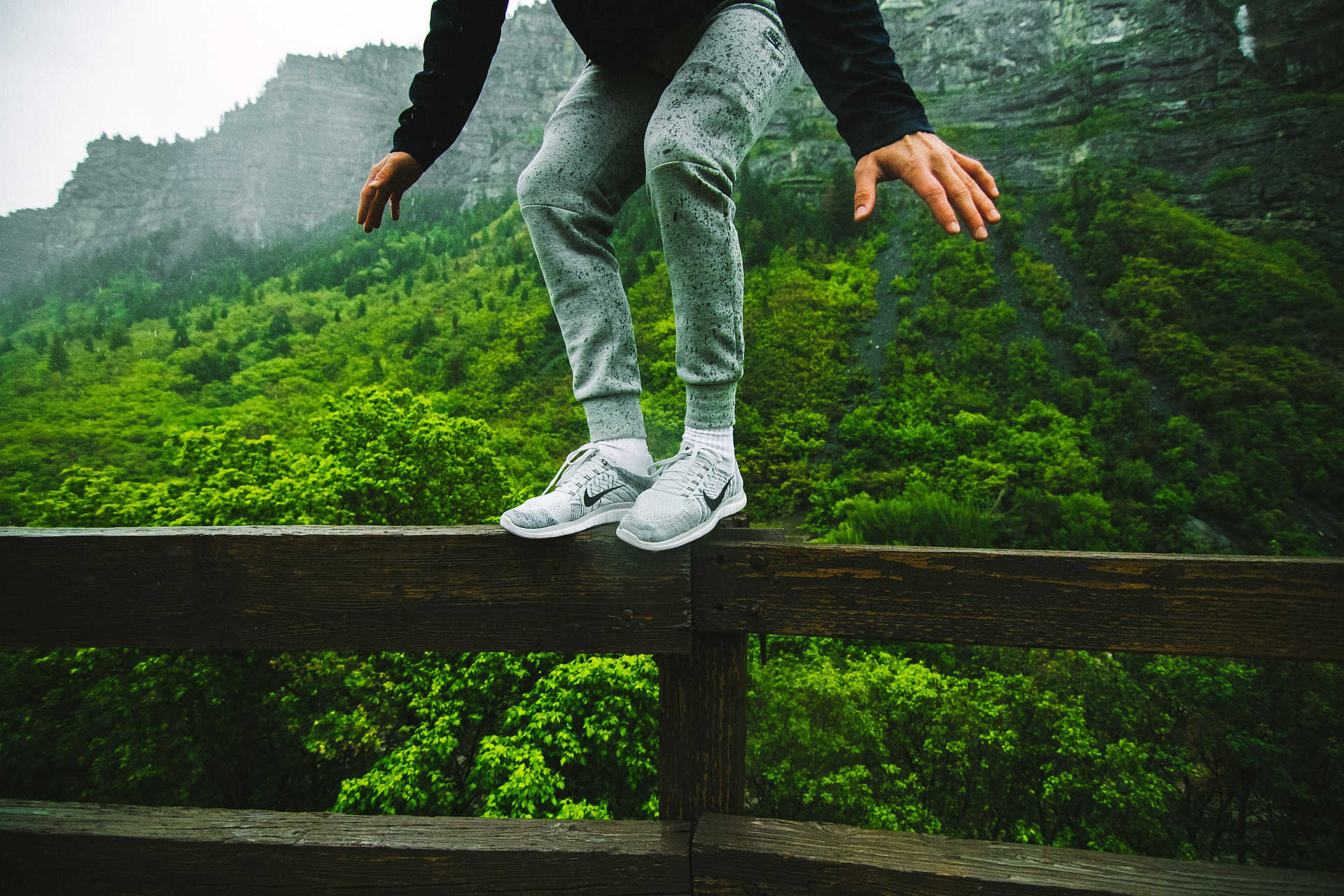 man balacing on a ledge